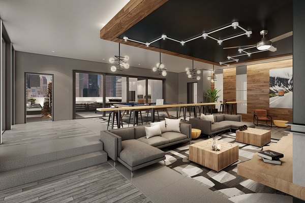 Clubhouse with modern design and seating areas at SOVA Apartments in Denver, perfect for socializing and relaxation