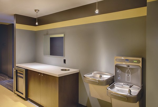 Modern fitness center with state-of-the-art equipment at SOVA Apartments, offering luxury living and wellness amenities