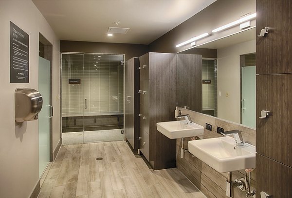 Modern fitness center with state-of-the-art equipment at SOVA Apartments, ideal for a luxury living experience