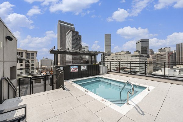 SOVA Apartments: Luxury pool with sun loungers and modern design features