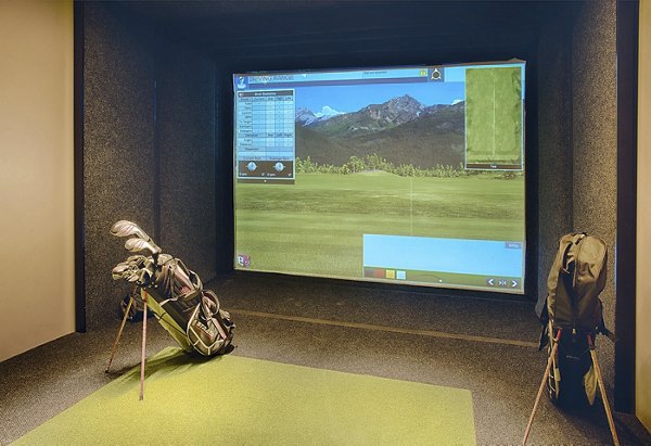 Relaxing putting green at SOVA Apartments offering recreational fun for residents