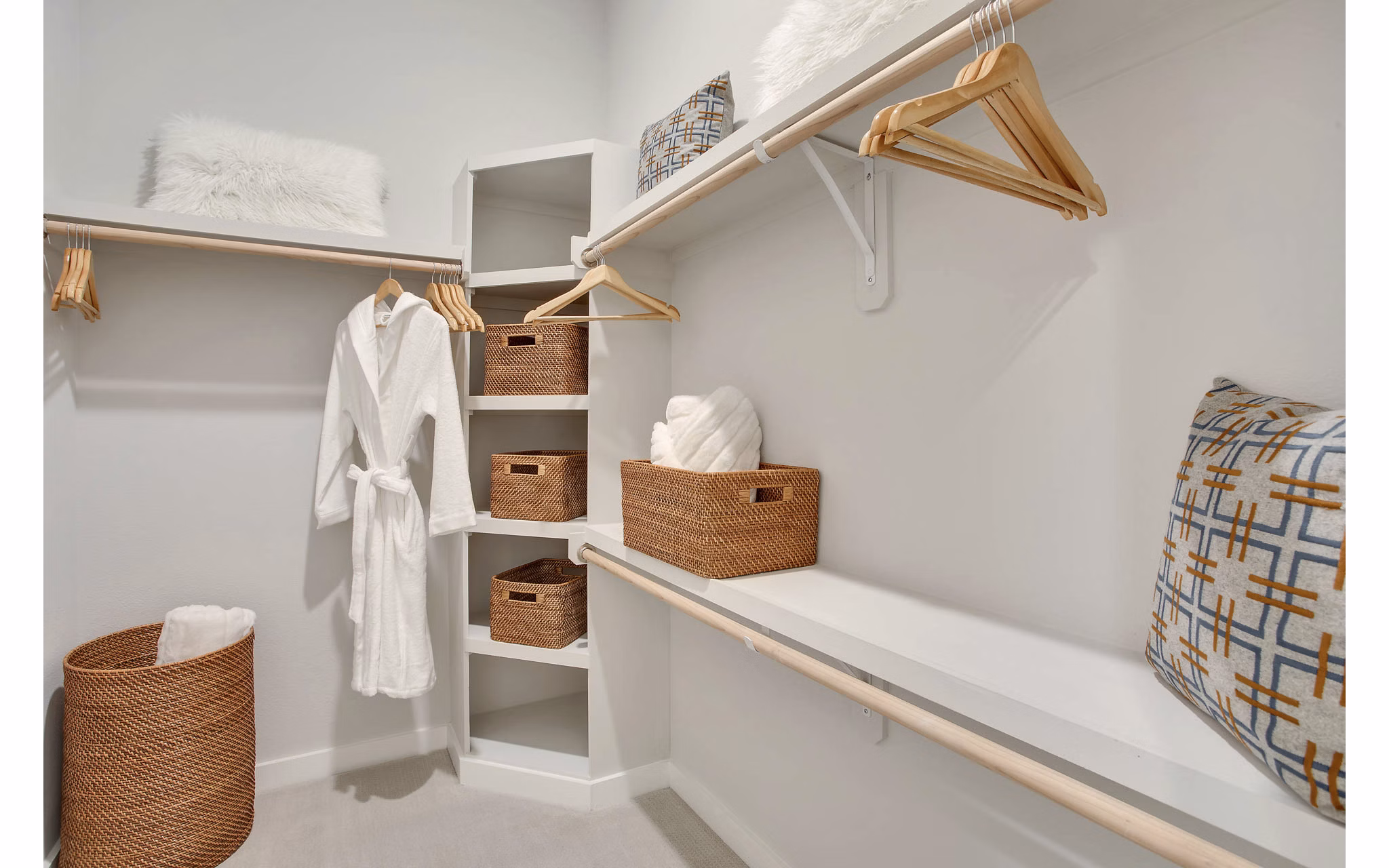 Walk-in closet with custom shelving at Overture 9th + CO Apartments