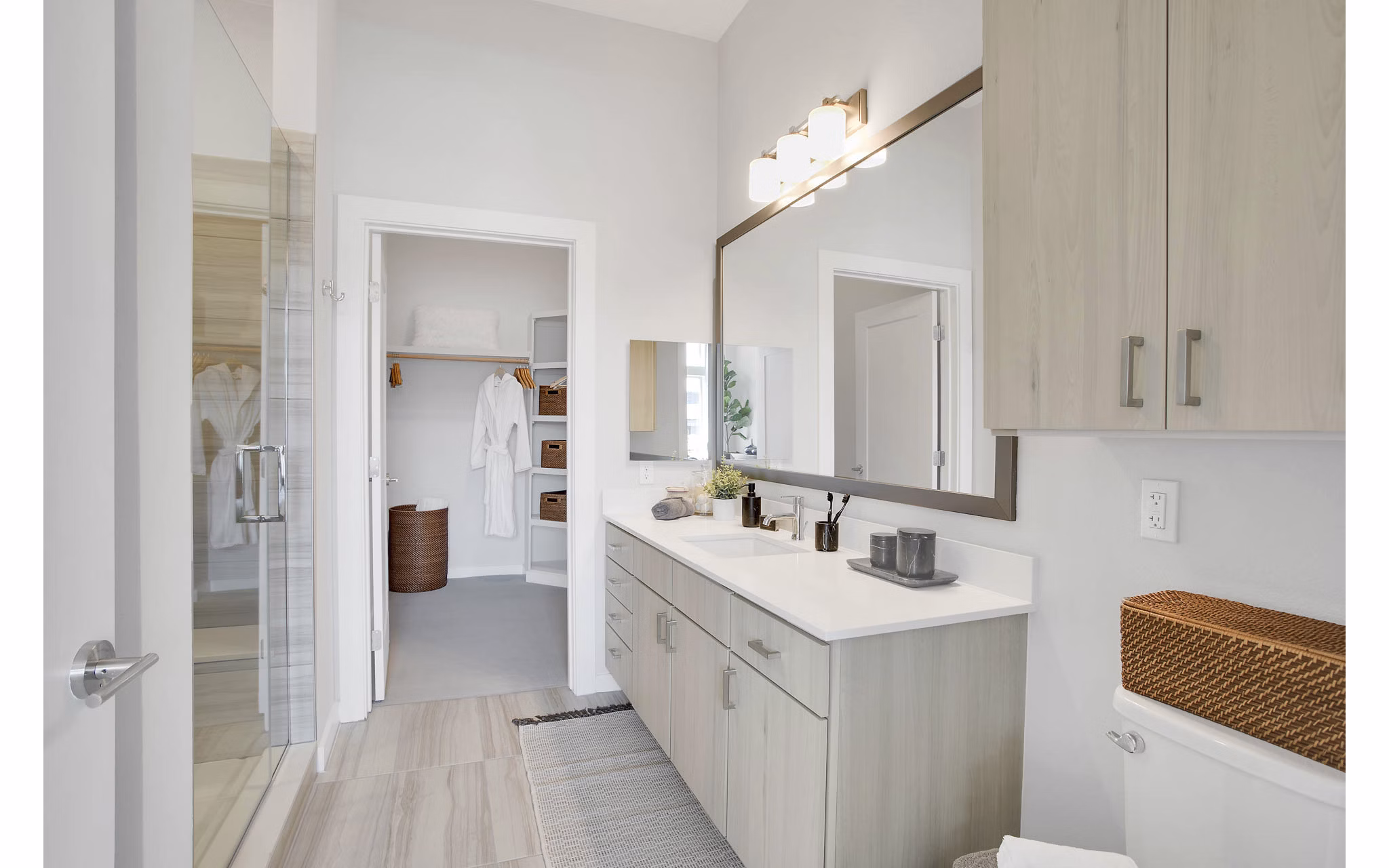 Modern bathroom with sleek fixtures at Overture 9th + CO Apartments