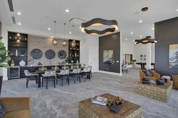 Modern clubhouse with stylish seating and open spaces at Overture 9th + CO Apartments