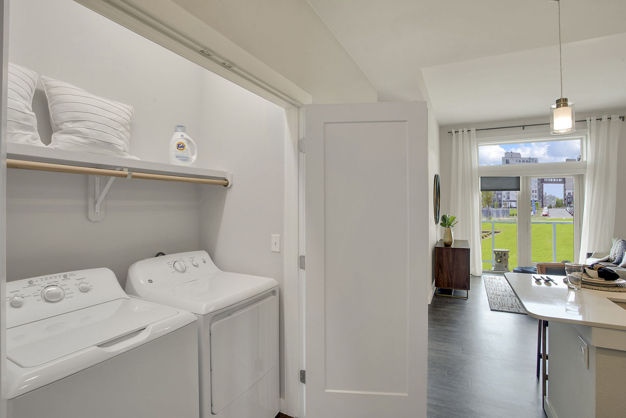 Laundry room at Overture 9Th + Co