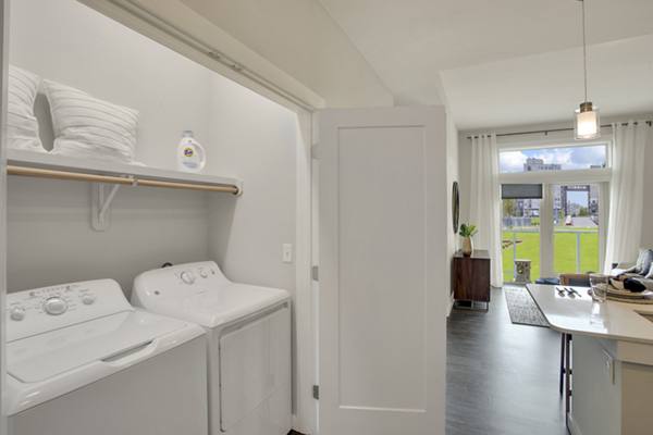 laundry room at Overture 9th + CO Apartments