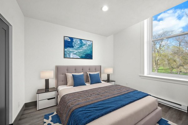 bedroom at The Academy Apartments