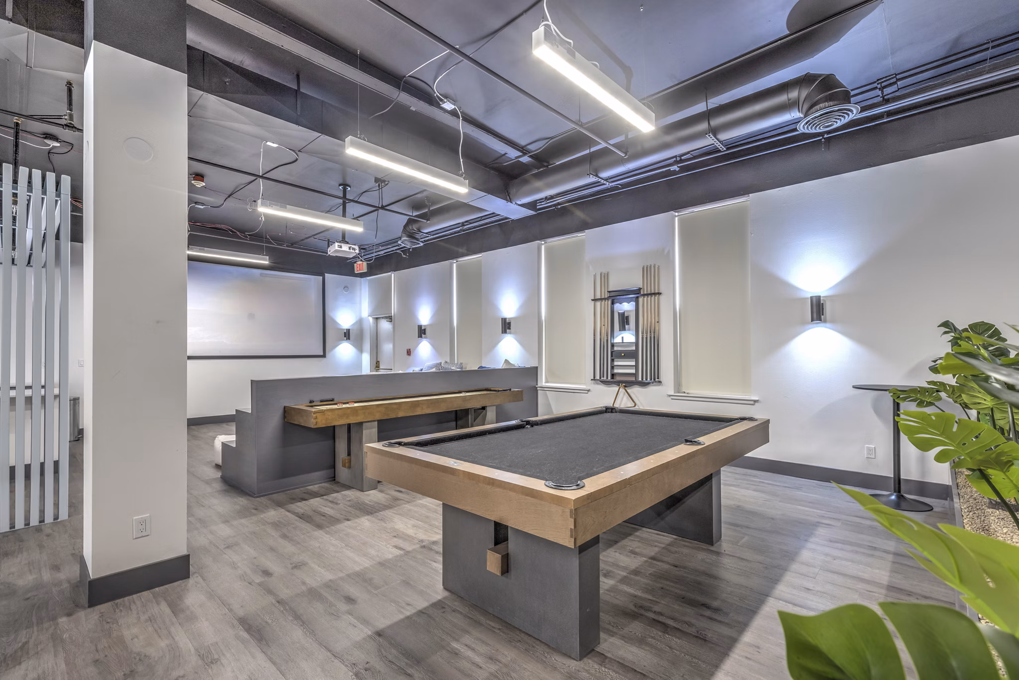 clubhouse game room at The Academy Apartments