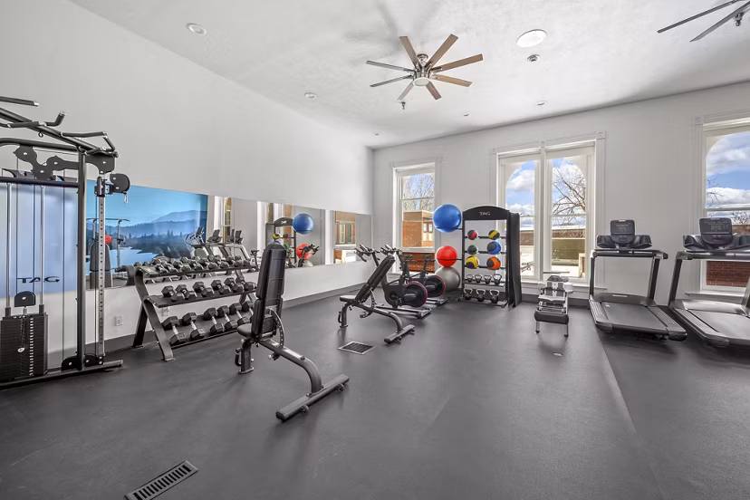 fitness center at The Academy Apartments