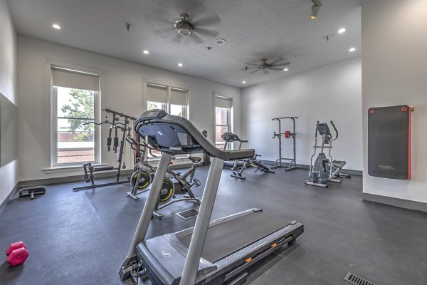 fitness center at The Academy Apartments