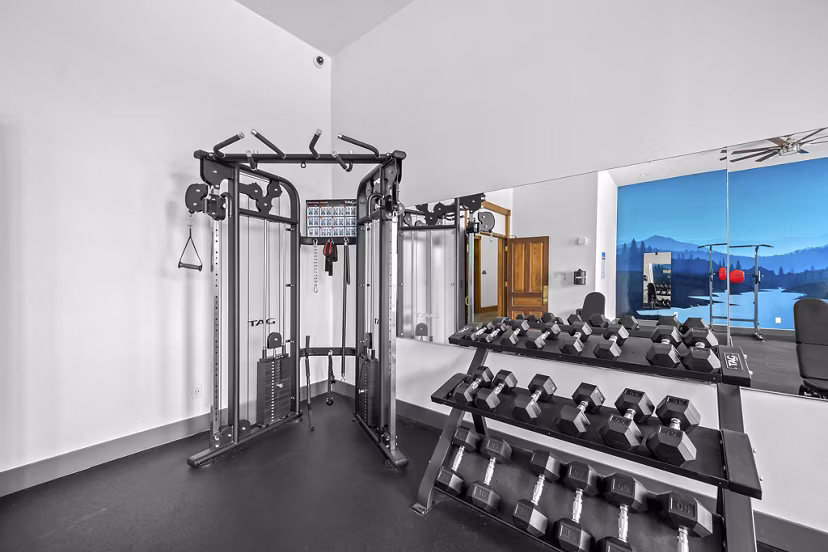 fitness center at The Academy Apartments