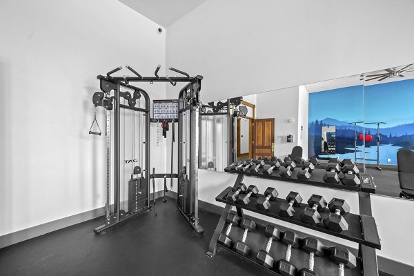 fitness center at The Academy Apartments