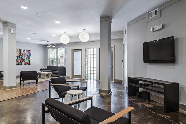 Lobby area featuring a contemporary design and cozy seating at Avana on Main Apartments