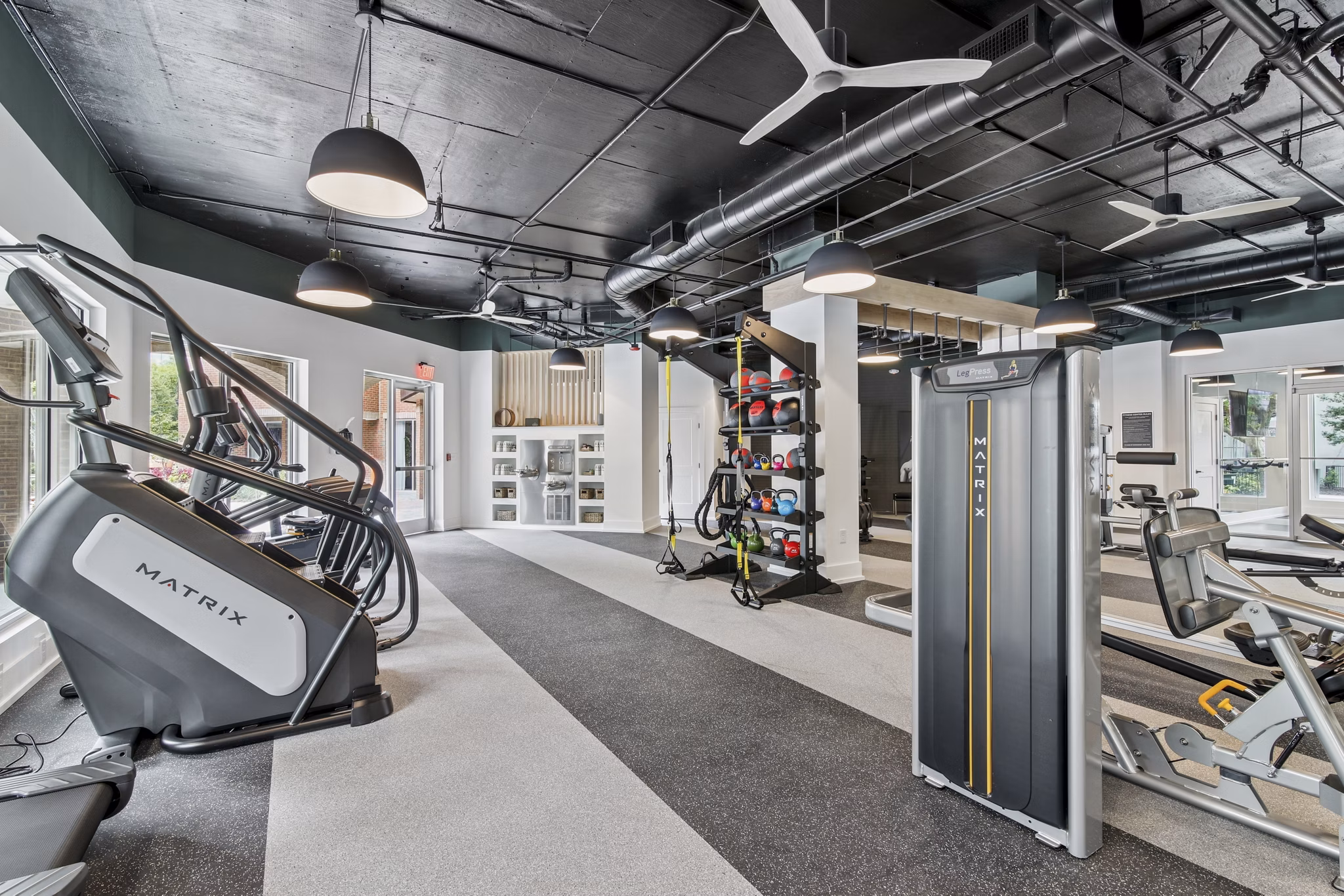 fitness center at Avana on Main Apartments 