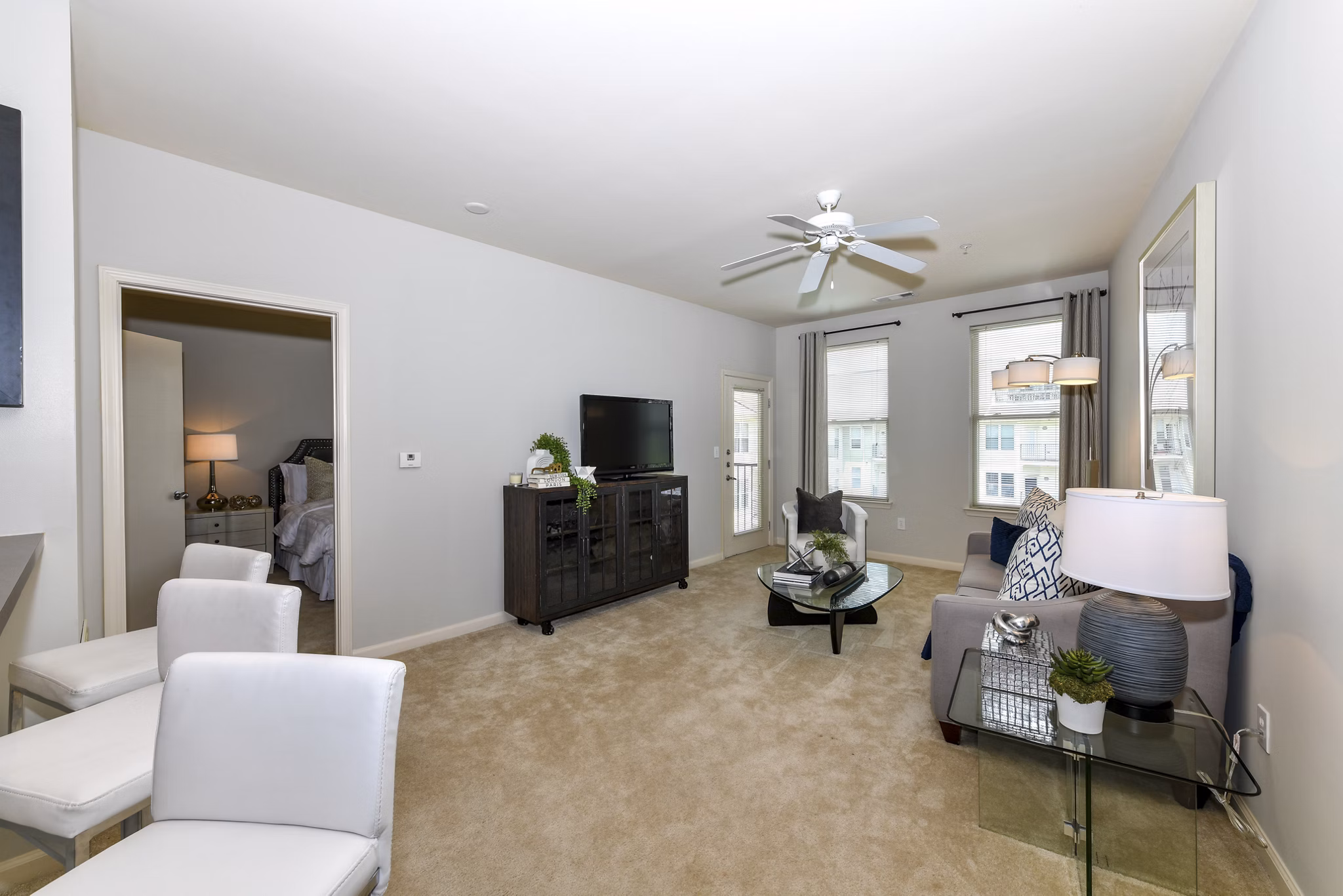 Modern living room with stylish furnishings at Avana on Main Apartments, a luxury property managed by Greystar