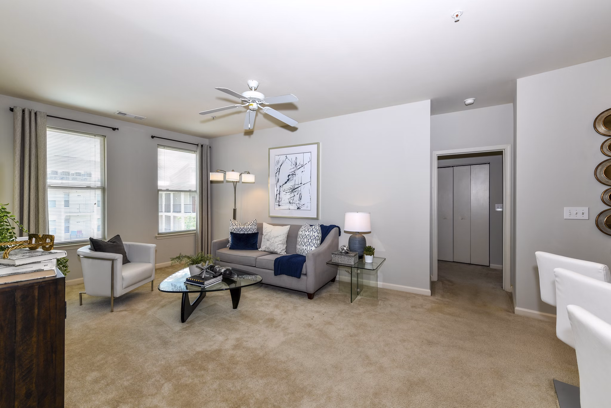 Spacious living room with contemporary design and natural light in Avana on Main Apartments
