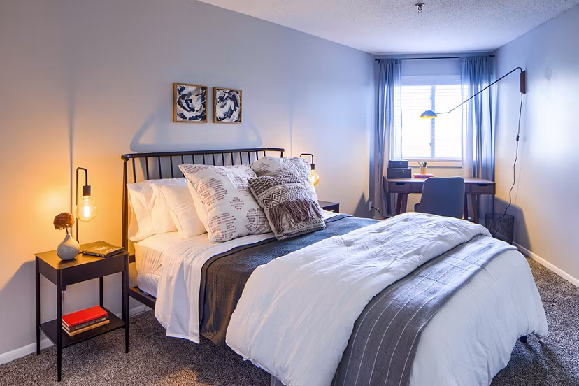 Cozy bedroom with minimalist decor at Avana Southview Apartments