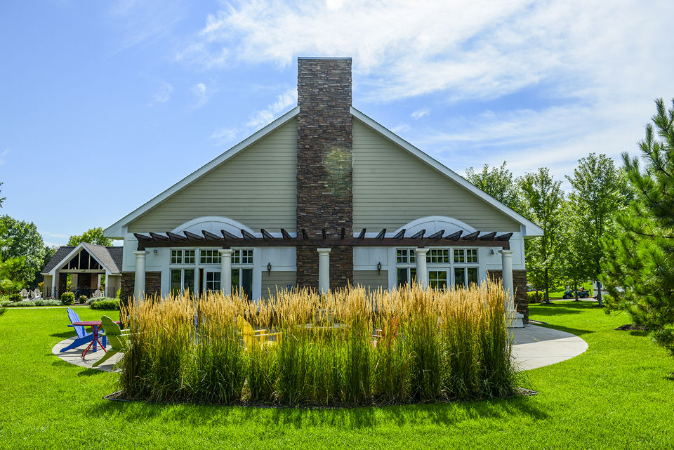 Clubhouse featuring modern design and spacious seating at Avana Southview Apartments