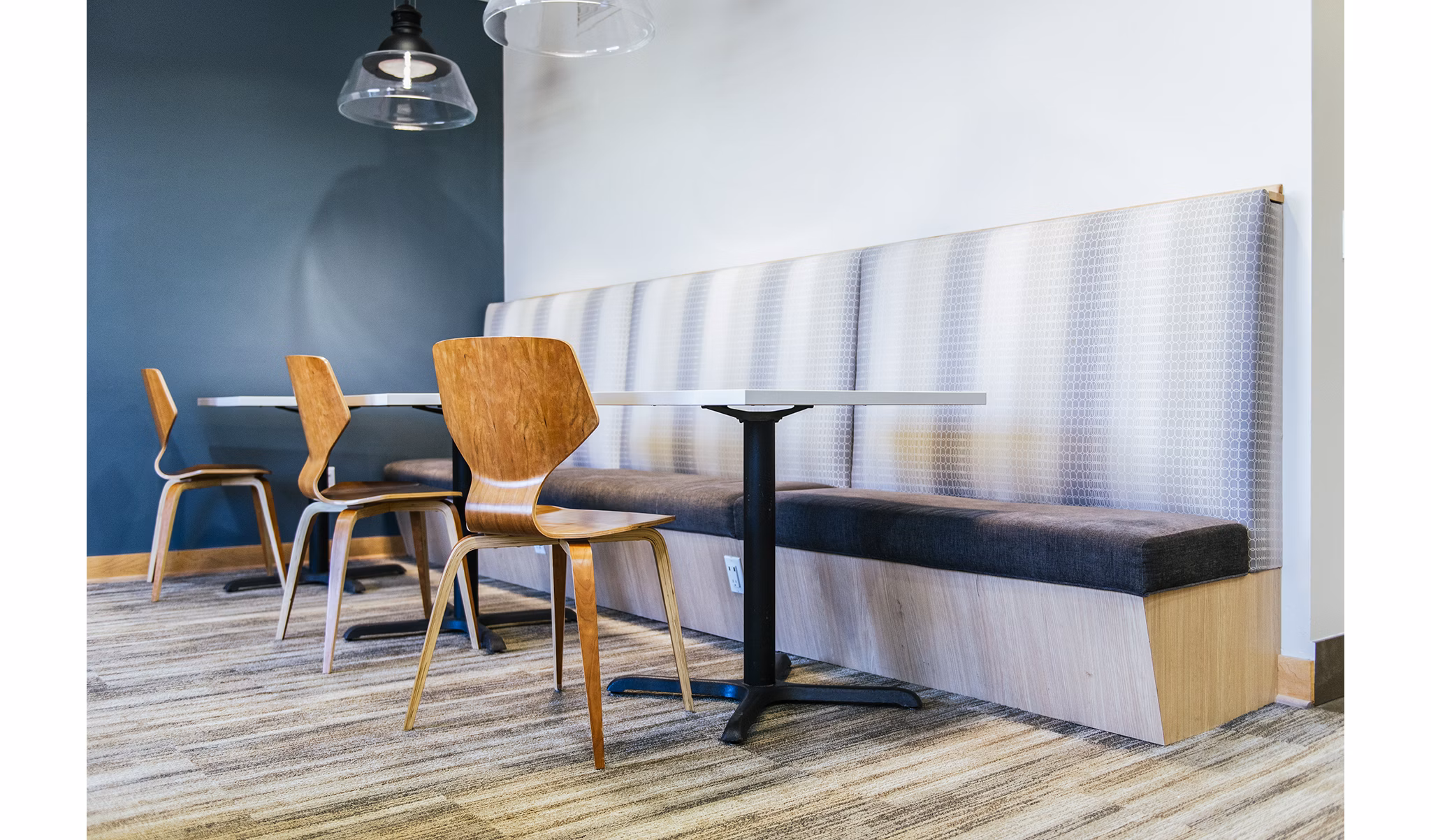 Contemporary clubhouse at Avana Southview Apartments featuring modern furnishings and spacious seating areas
