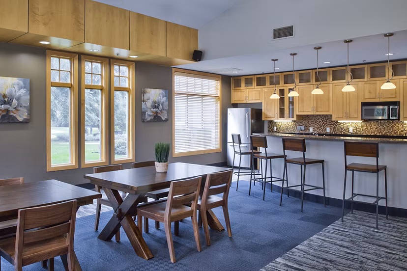 Clubhouse with modern design and spacious seating areas at Avana Southview Apartments