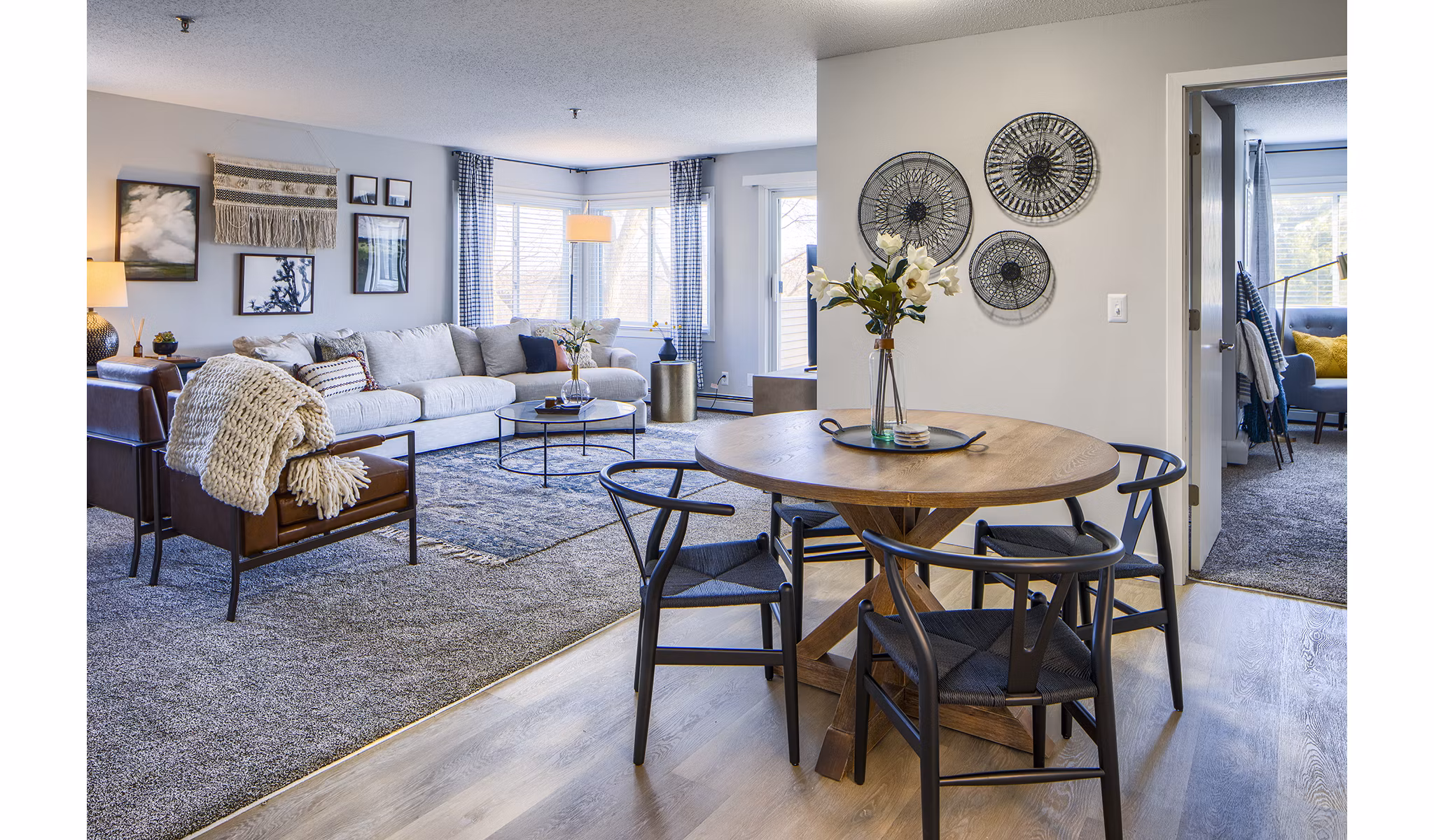 Dining room with modern decor and natural lighting at Avana Southview Apartments