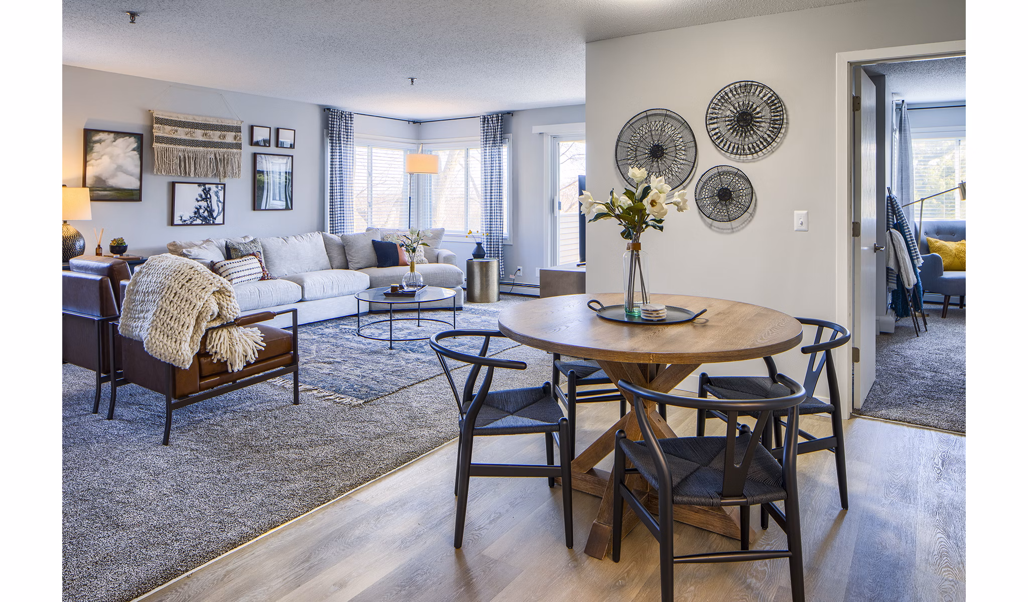 Dining room with modern decor and natural lighting at Avana Southview Apartments
