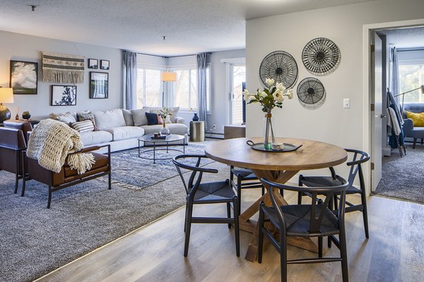 Dining room with modern decor and natural lighting at Avana Southview Apartments
