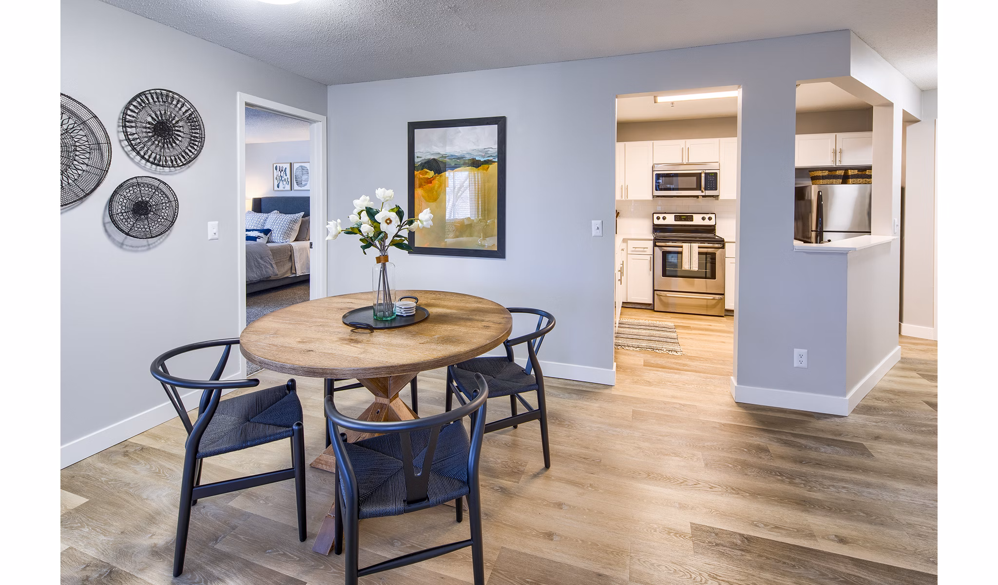 Dining room with modern furnishings at Avana Southview Apartments: luxury living in elegantly designed spaces