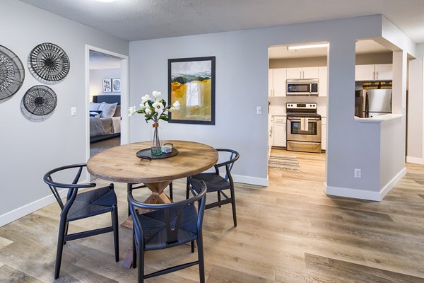 Dining room with modern furnishings at Avana Southview Apartments: luxury living in elegantly designed spaces