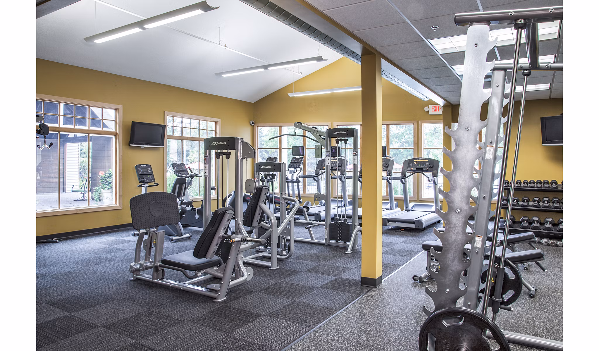 Modern fitness center with state-of-the-art equipment at Avana Southview Apartments