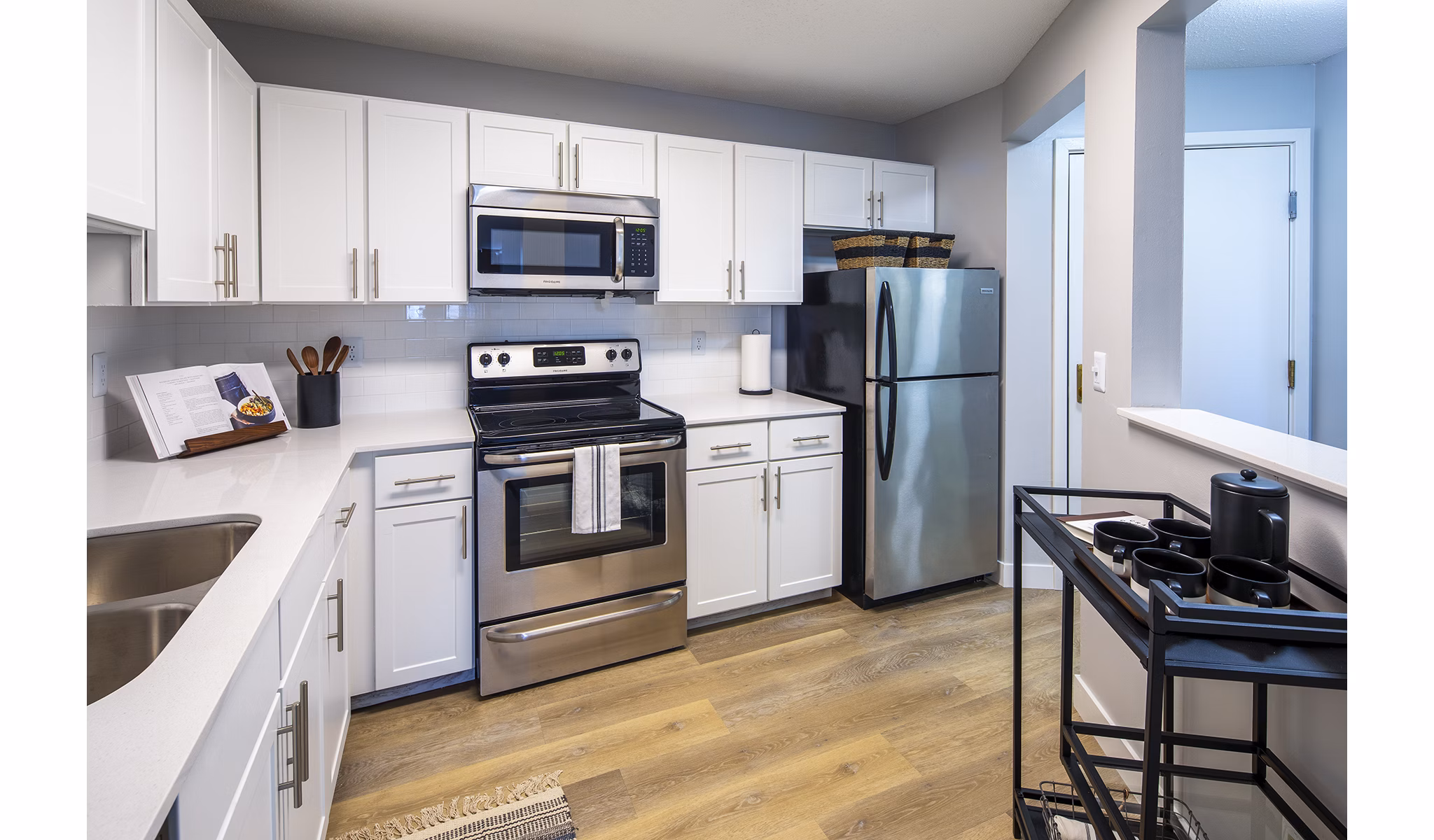 Modern kitchen with sleek cabinetry and stainless steel appliances at Avana Southview apartments