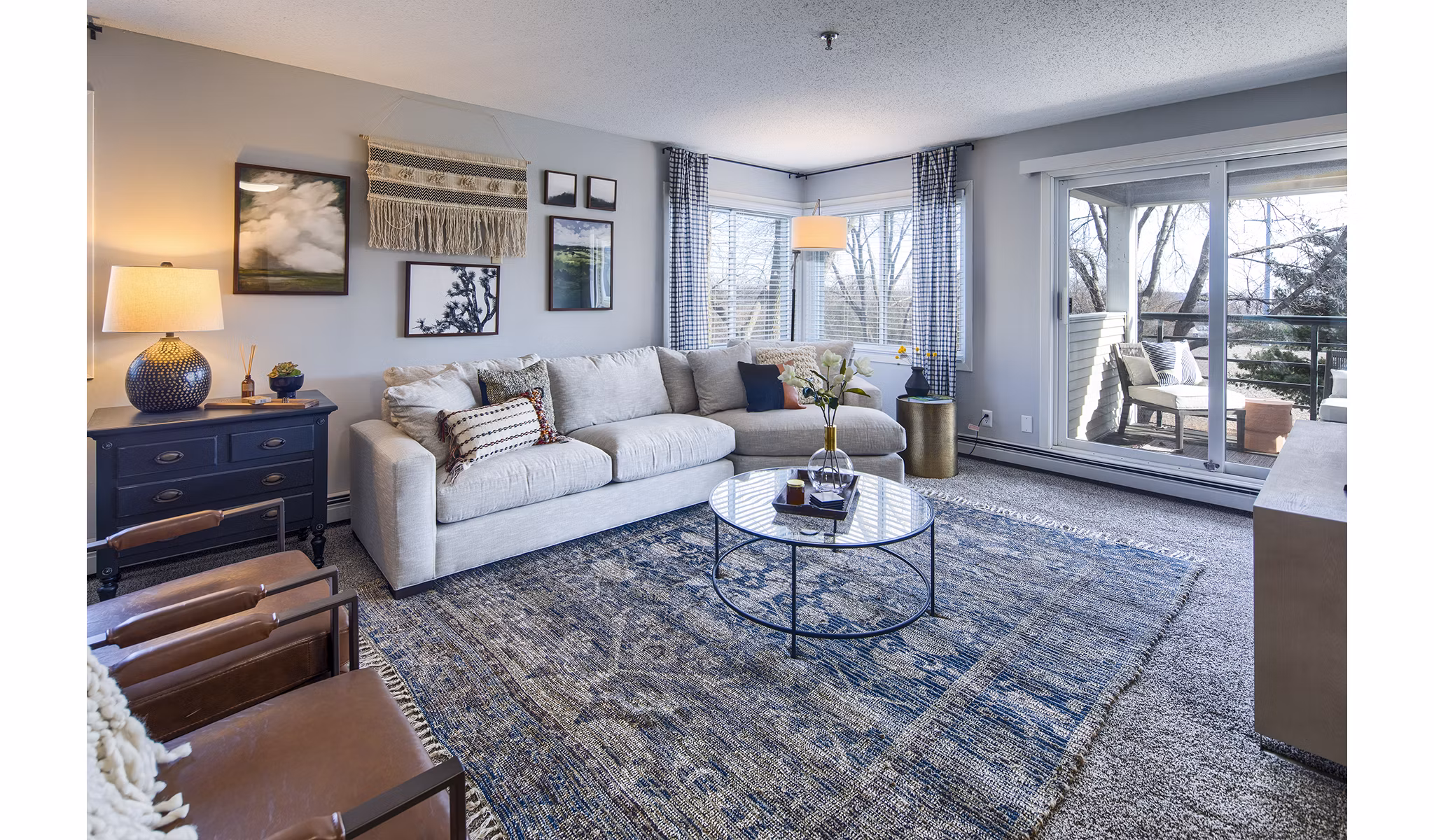 Spacious living room with designer furnishings in Avana Southview Apartments