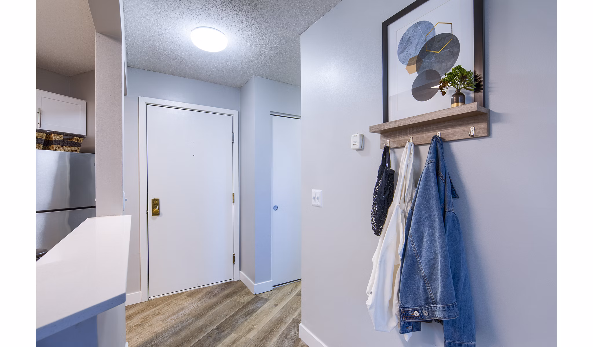 Elegant hallway with modern lighting at Avana Southview Apartments in St Louis Park, ideal for a comfortable lifestyle