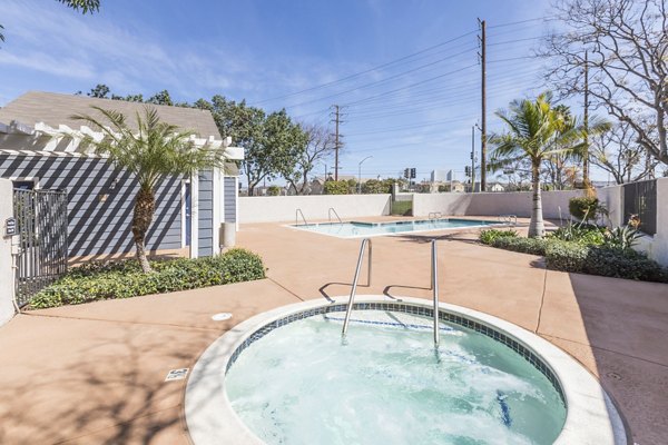 Stylish outdoor jacuzzi at Avana Springs Apartments perfect for relaxation and leisure