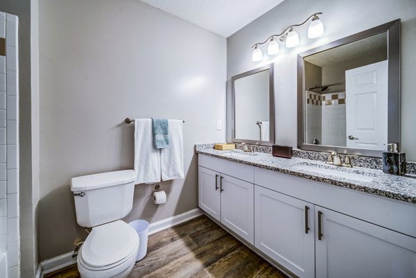 Contemporary bathroom with sleek fixtures at Autumn Woods Apartments