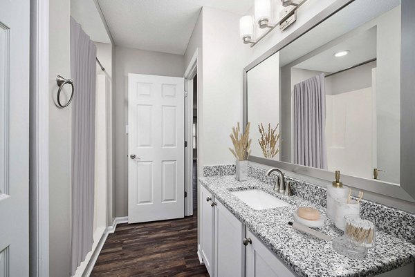 Modern bathroom with sleek fixtures at Autumn Woods Apartments