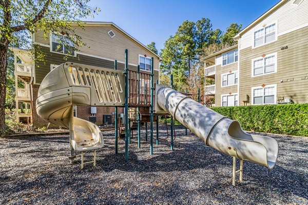 Playground with modern equipment at Autumn Woods Apartments, a Greystar community ideal for family-friendly outdoor recreation