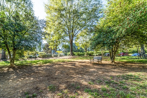 Pet-friendly dog park with agility equipment at Autumn Woods Apartments