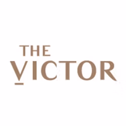 logo for The Victor Apartments