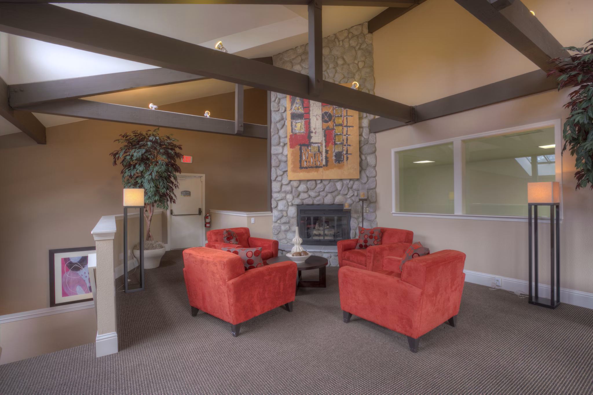 Clubhouse with modern lounge spaces at Riverstone Apartments offering luxury amenities