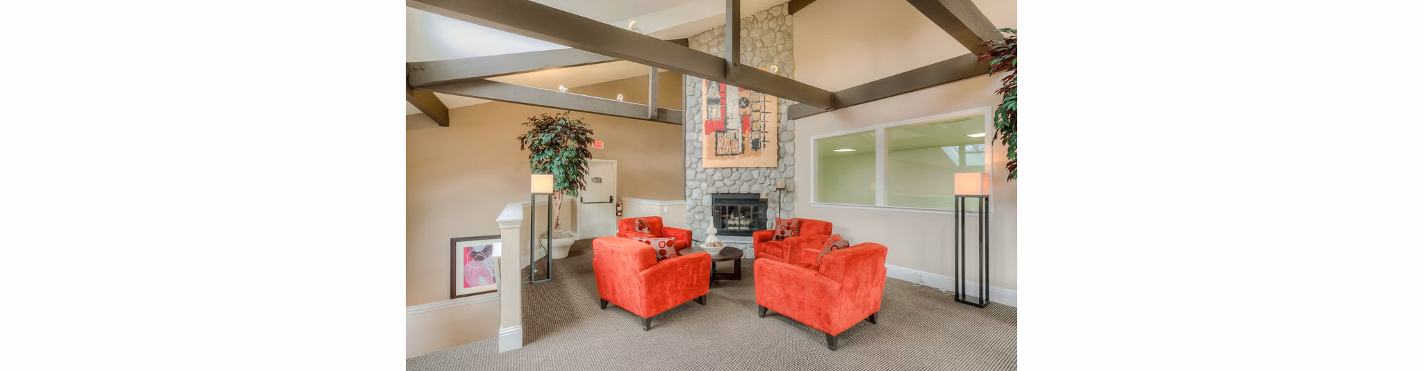 Clubhouse featuring modern design and comfortable seating at Riverstone Apartments