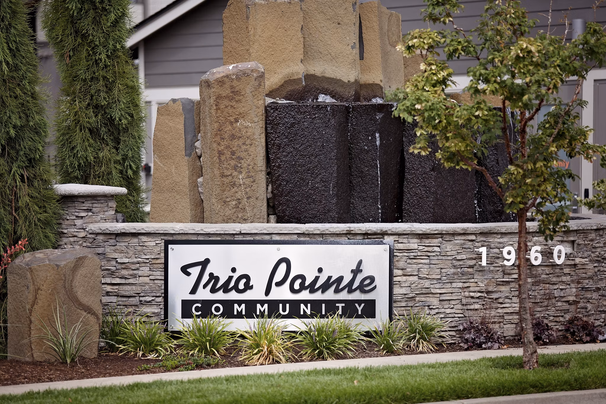 Trio Pointe: Entrance signage at luxury apartments in desirable location