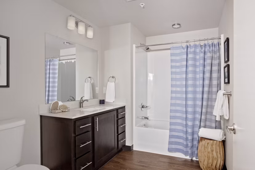 Modern bathroom with sleek fixtures at Trio Pointe Apartments