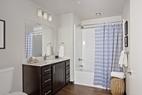 Modern bathroom with sleek fixtures at Trio Pointe Apartments