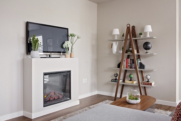 Modern living room with stylish decor at Trio Pointe