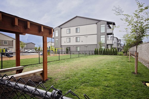 Dog park with agility equipment at Trio Pointe luxury apartments