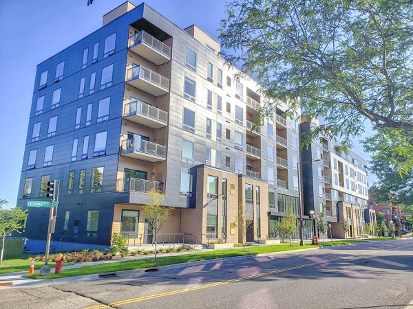 Irvine Exchange Apartments: Contemporary building with sleek design and green landscaping in a luxury apartment community