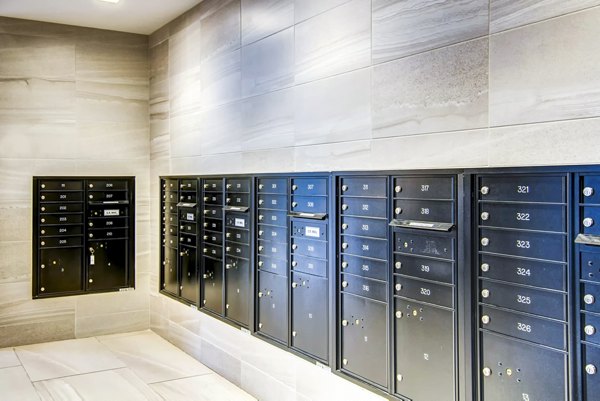 Mail room with secure package lockers at Irvine Exchange Apartments