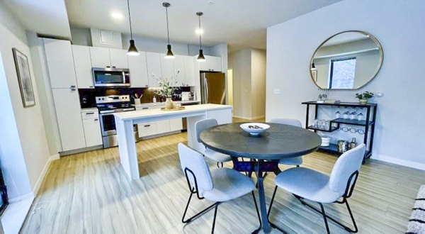 Elegant dining room with modern furnishings at Irvine Exchange Apartments, highlighting luxury living in this premier California community