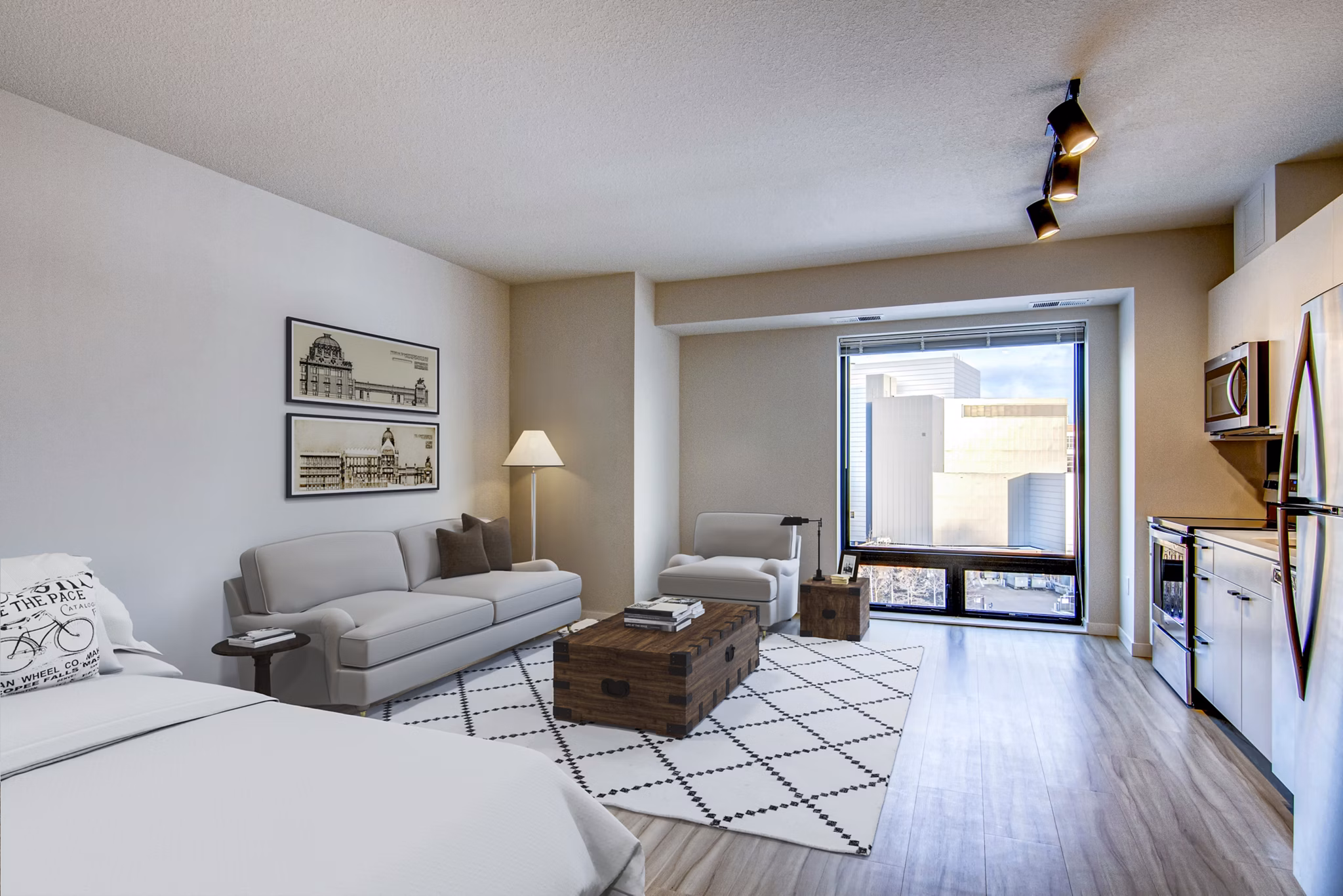 Modern kitchen featuring stainless steel appliances and granite countertops in Irvine Exchange Apartments